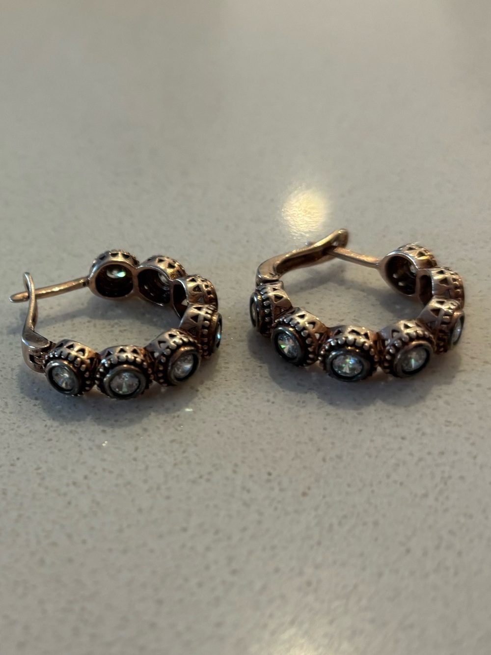 Vintage-Inspired Silver Hoop Earrings with Clear Stones